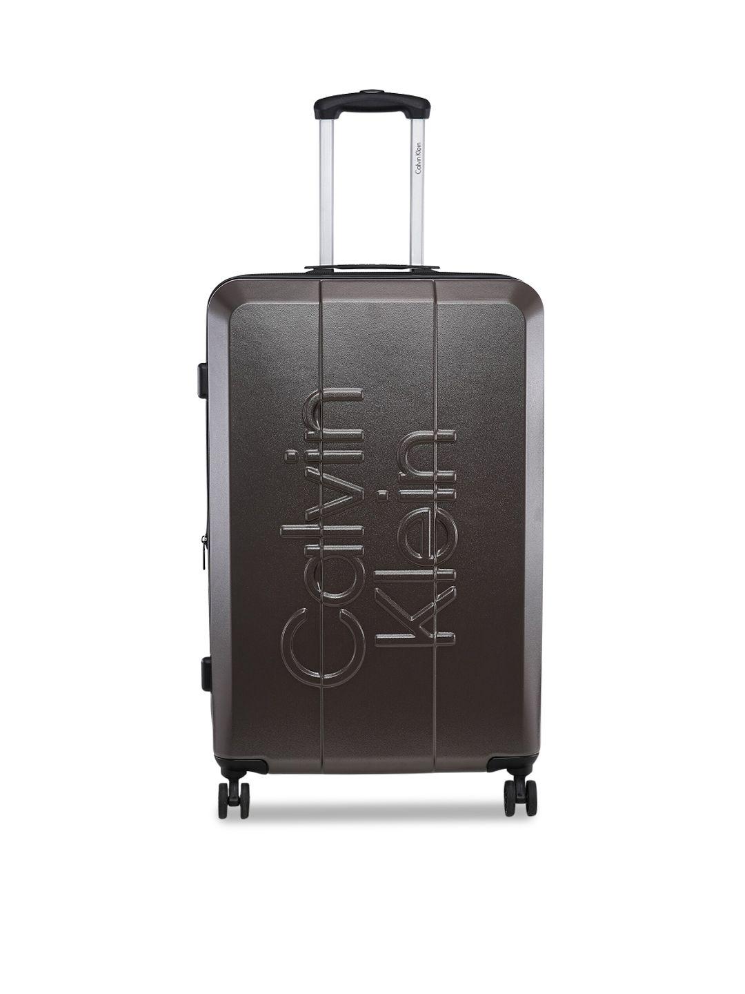calvin klein textured hard-sided large trolley bag