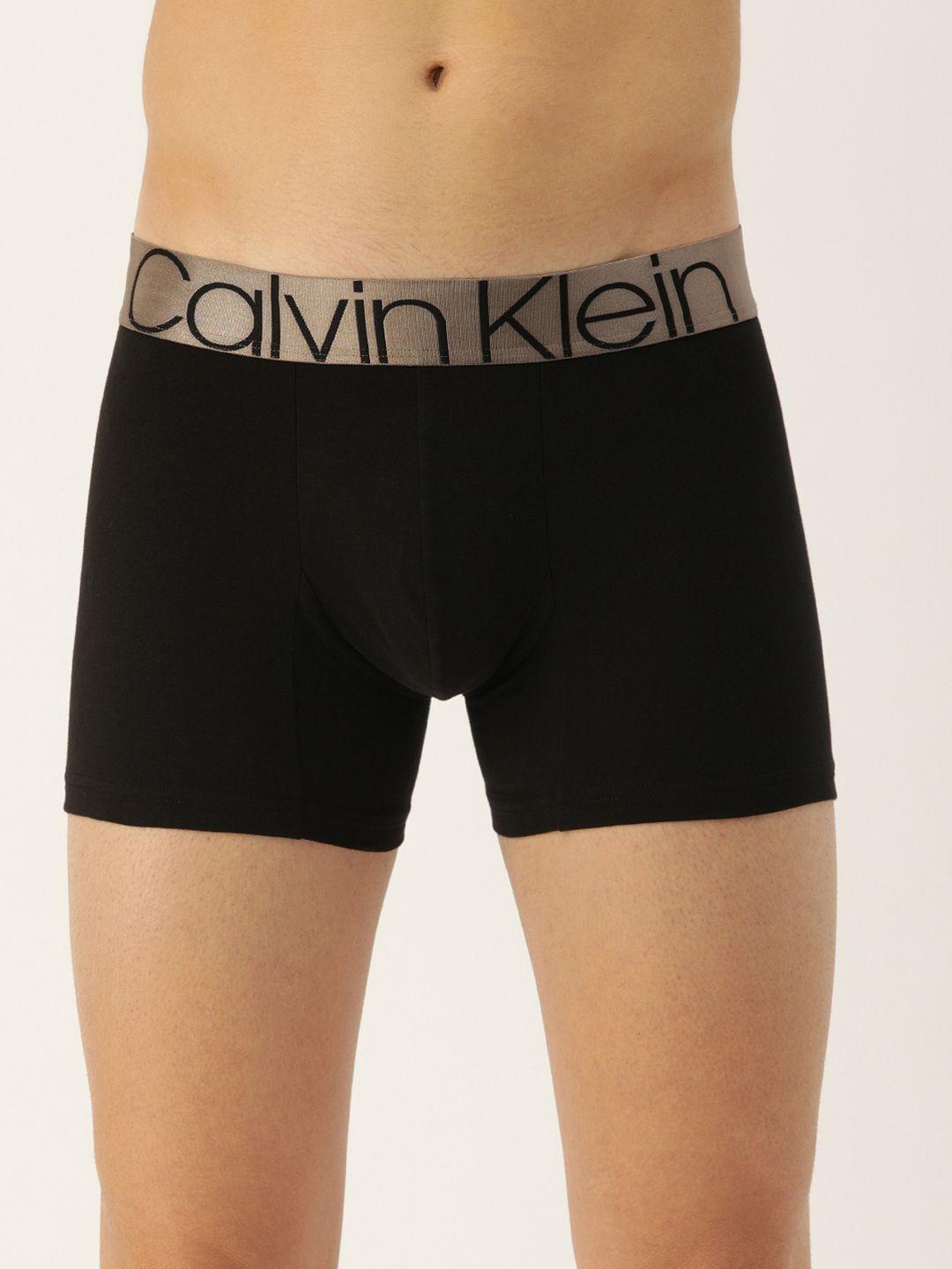 calvin klein underwear men black solid trunk nb2537ub1