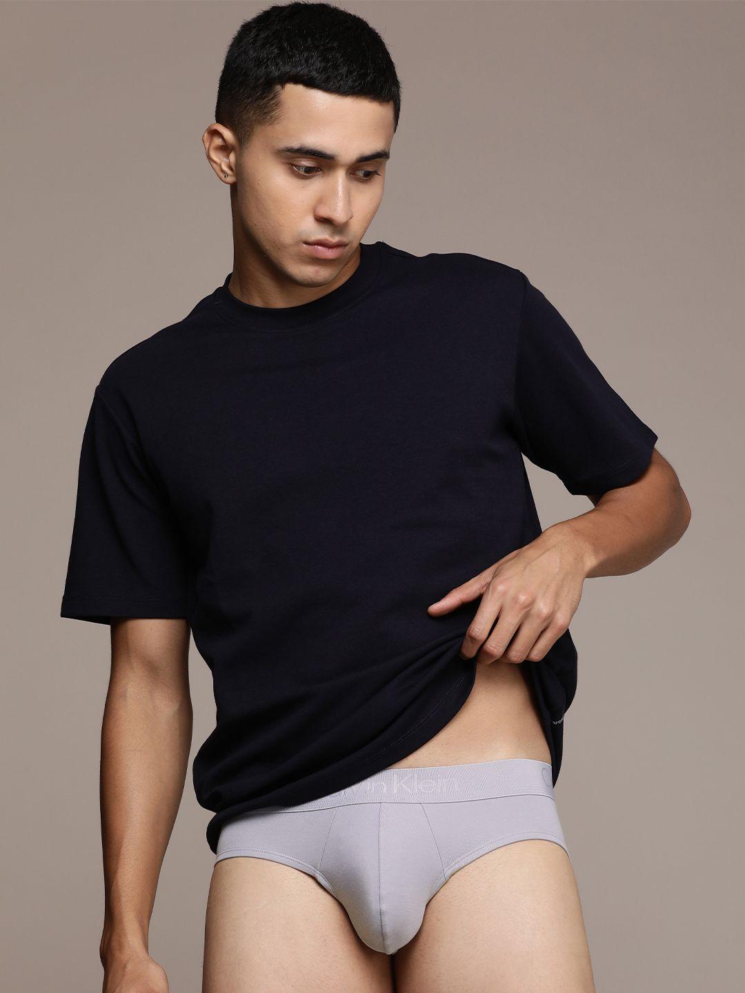 calvin klein underwear men mid-rise solid briefs nb3629ftv