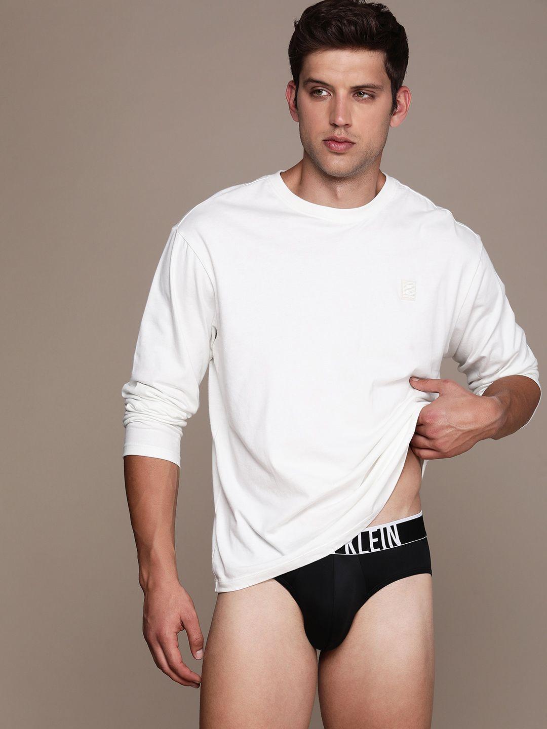 calvin klein underwear men solid briefs nb3835ub1-ub1-black