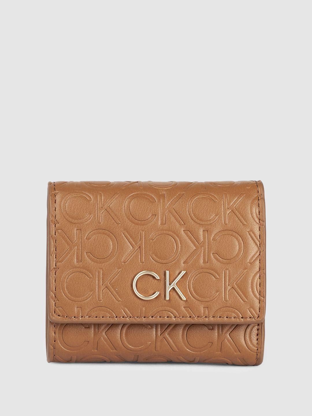 calvin klein women brand logo textured three fold wallet