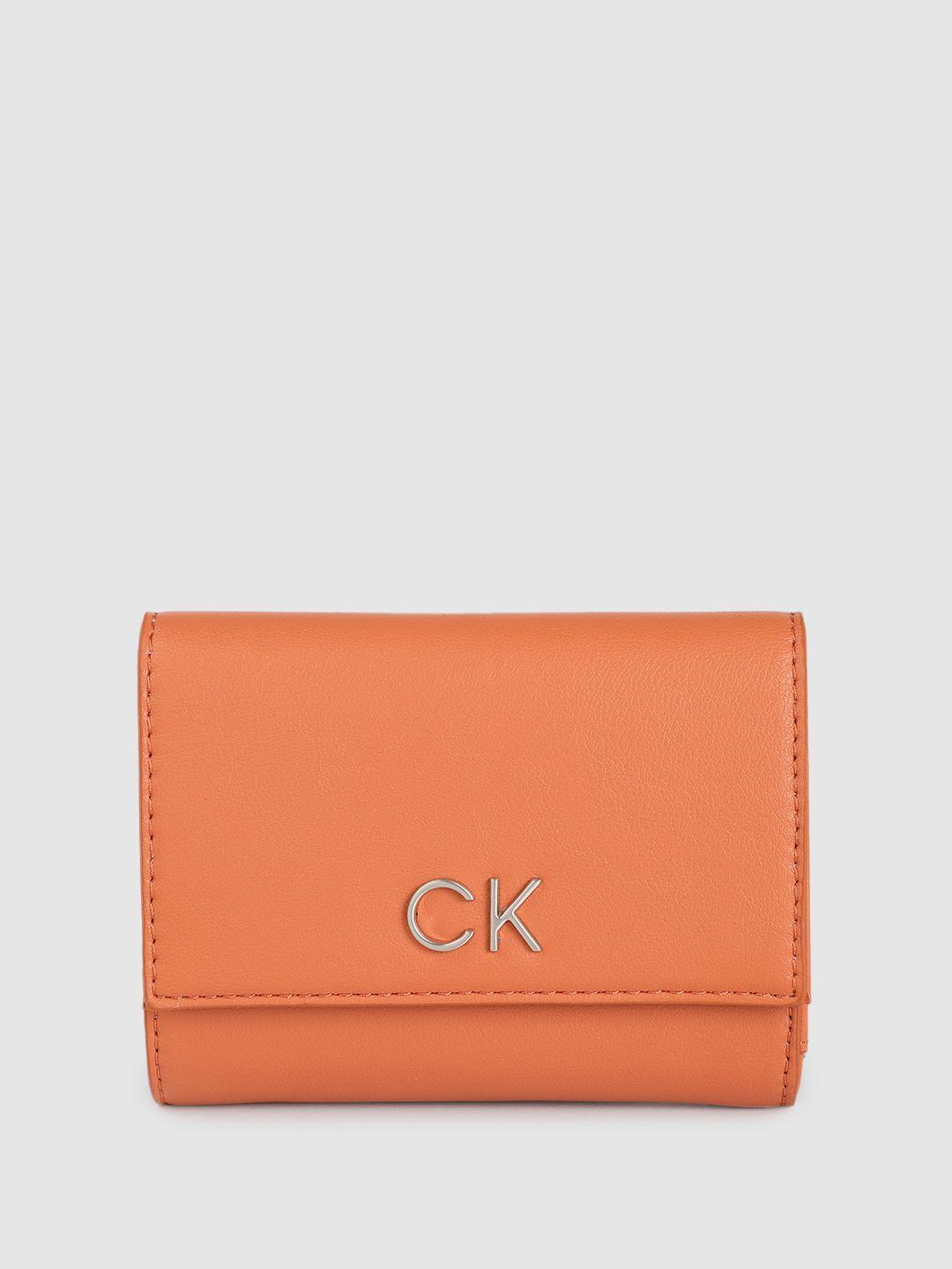 calvin klein women solid three fold wallet