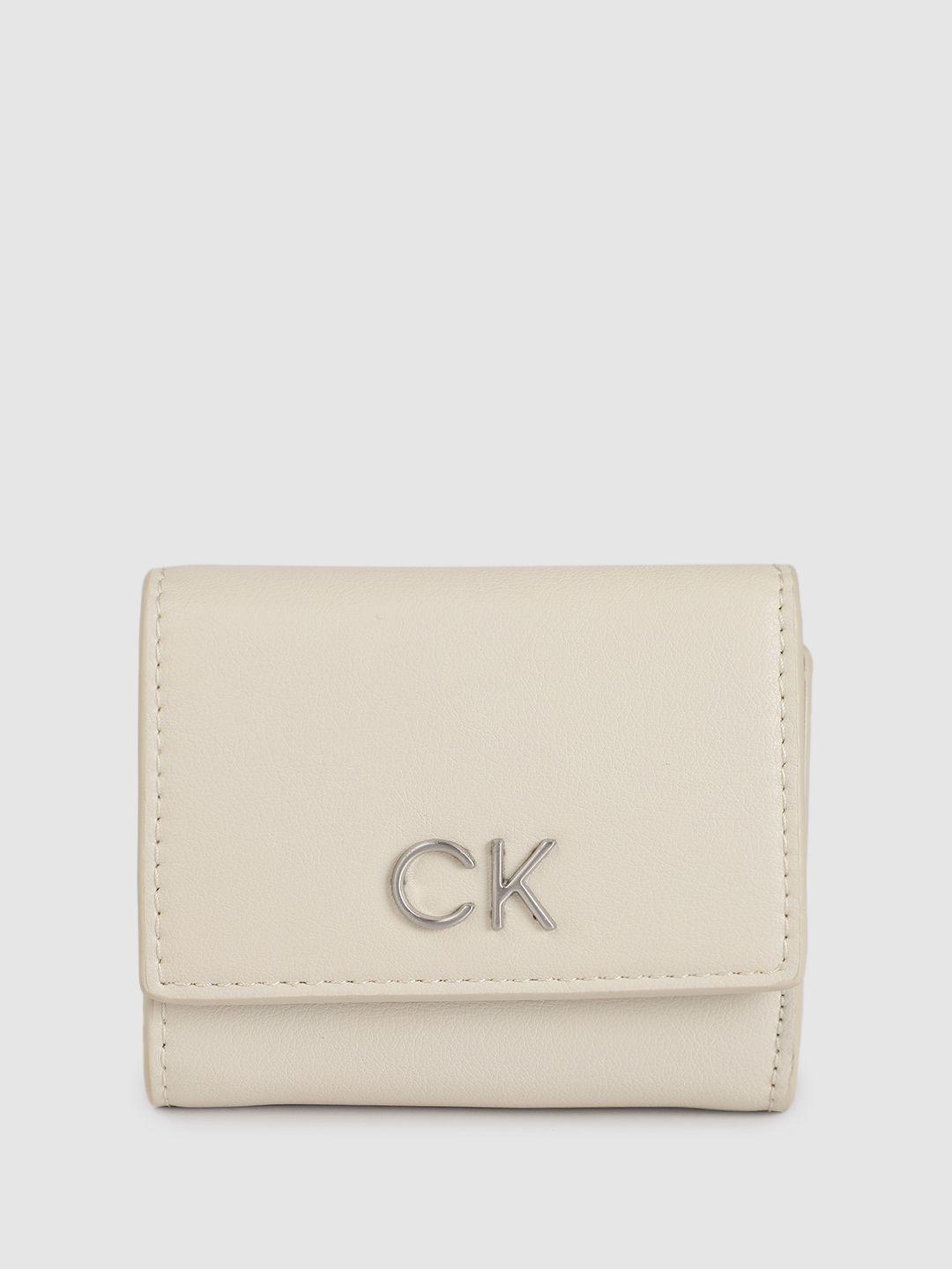 calvin klein women solid three fold wallet