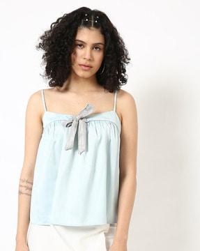 cami top with sequined bow accent