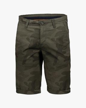 camo print shorts with upturned hems