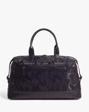 camouflage print duffel bag with zip pocket