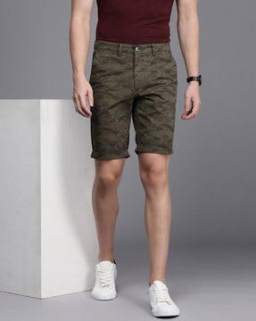 camouflage print slim fit flat-front shorts
