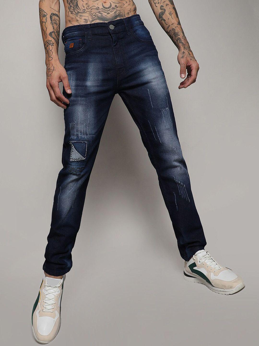campus sutra men smart slim fit mildly distressed light fade jeans