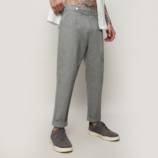 campus sutra men solid pleated regular fit trousers