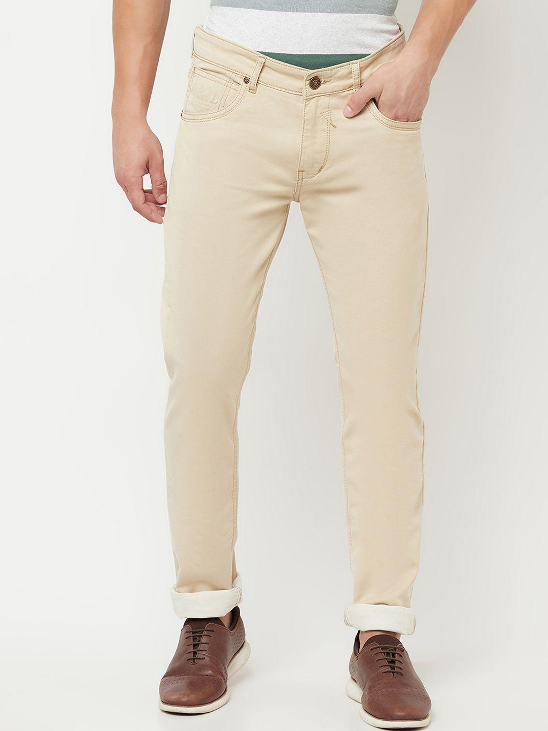cantabil men beige solid mid-rise regular fit jeans