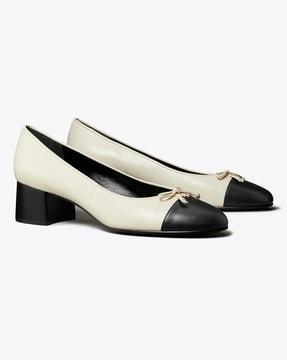 cap-toe pumps