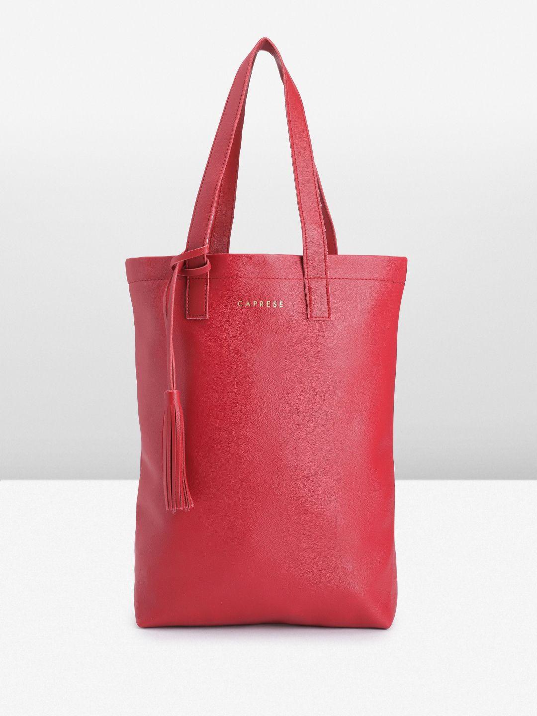 caprese oversized bucket shoulder bag with tasselled detail