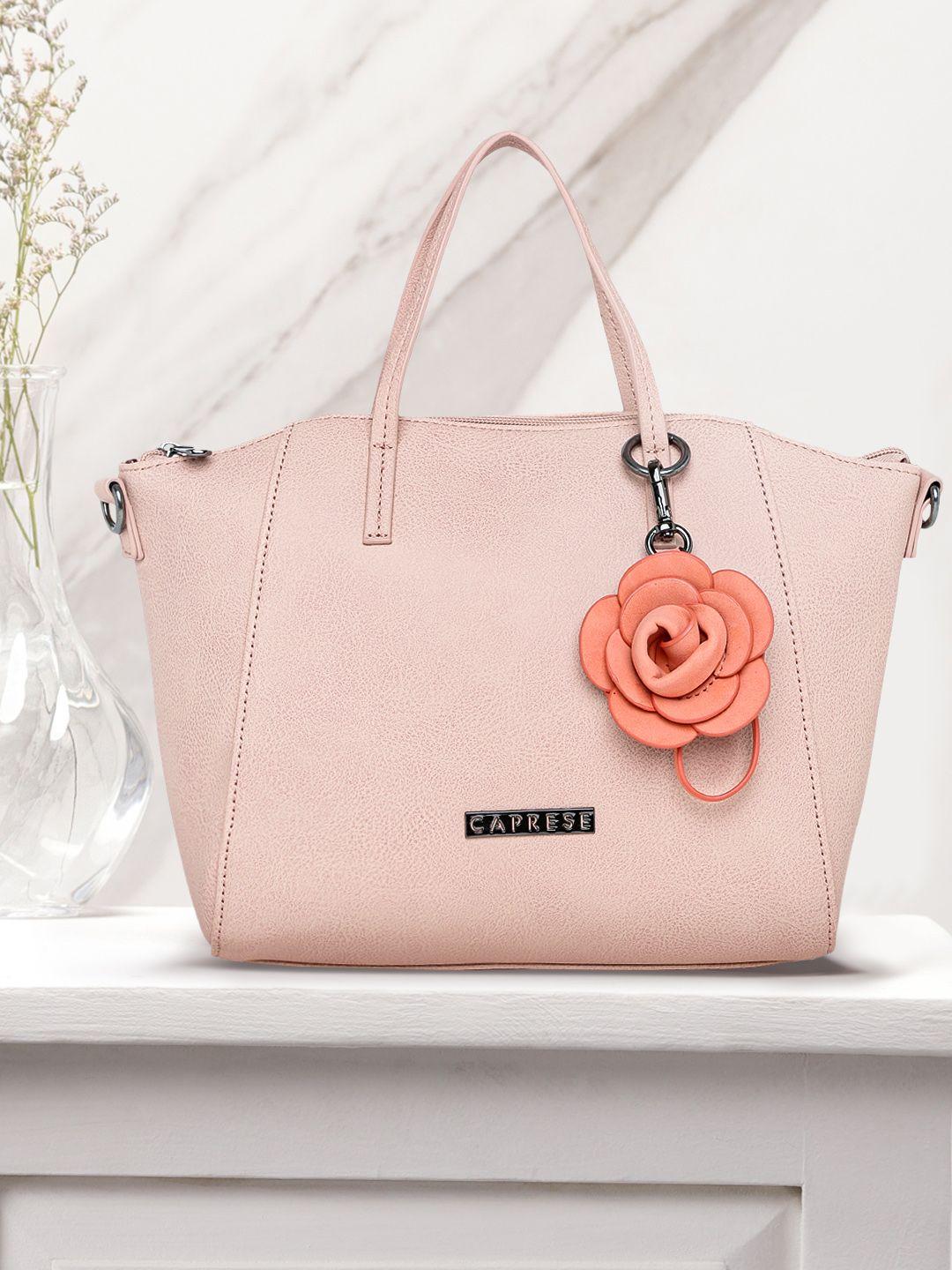 caprese peach-coloured solid handheld bag