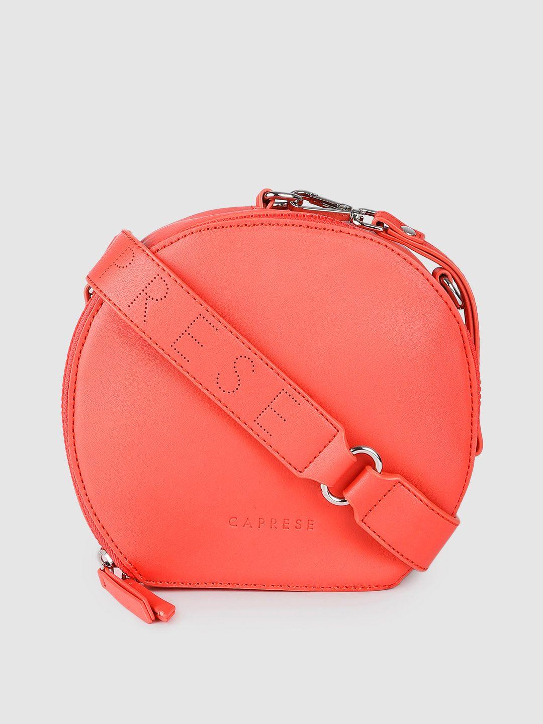 caprese coral solid structured sling bag