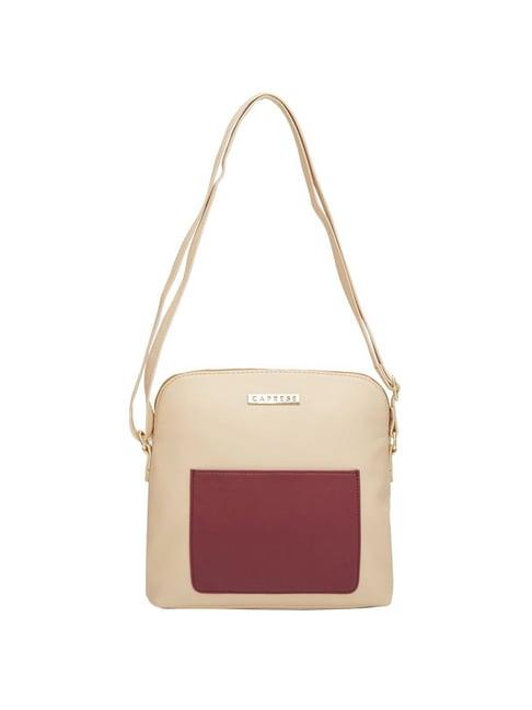 caprese destin beige faux leather solid sling handbag
