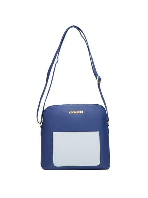 caprese destin navy faux leather solid sling handbag