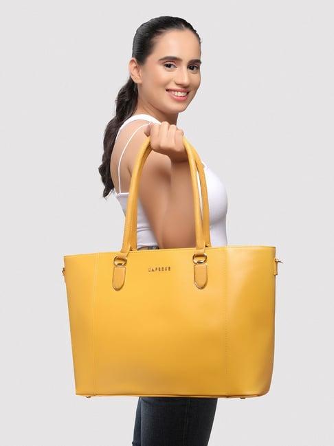 caprese esme yellow faux leather solid laptop tote handbag