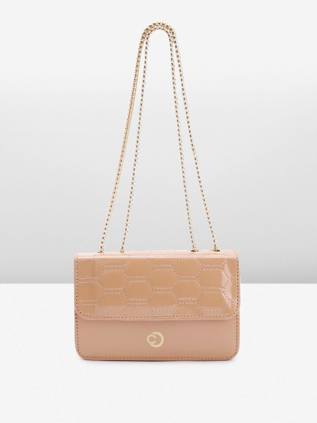 caprese geometric textured sling bag