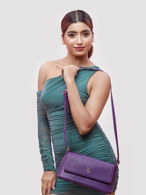 caprese march purple faux leather solid sling handbag