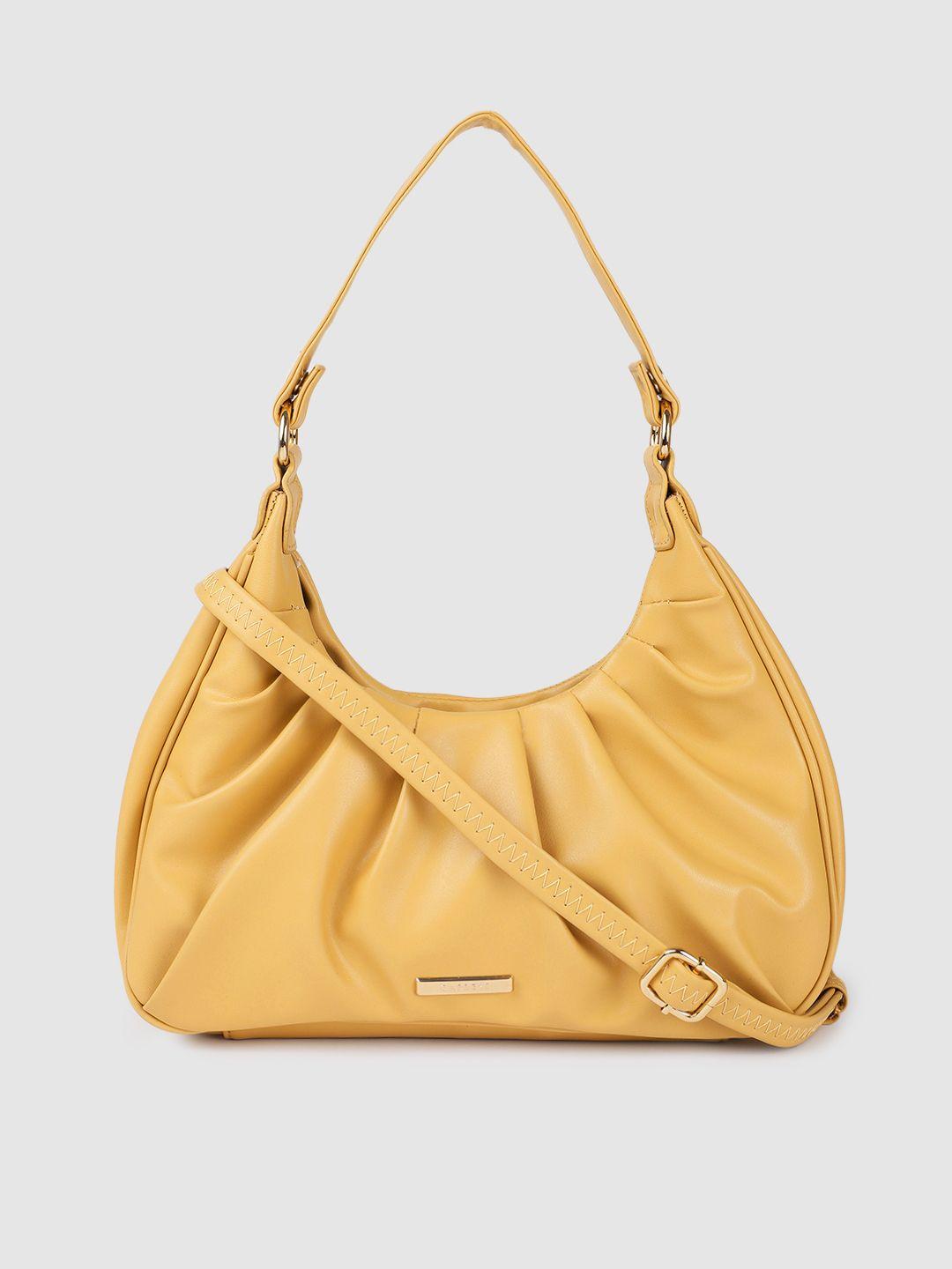 caprese mustard yellow solid structured hobo bag