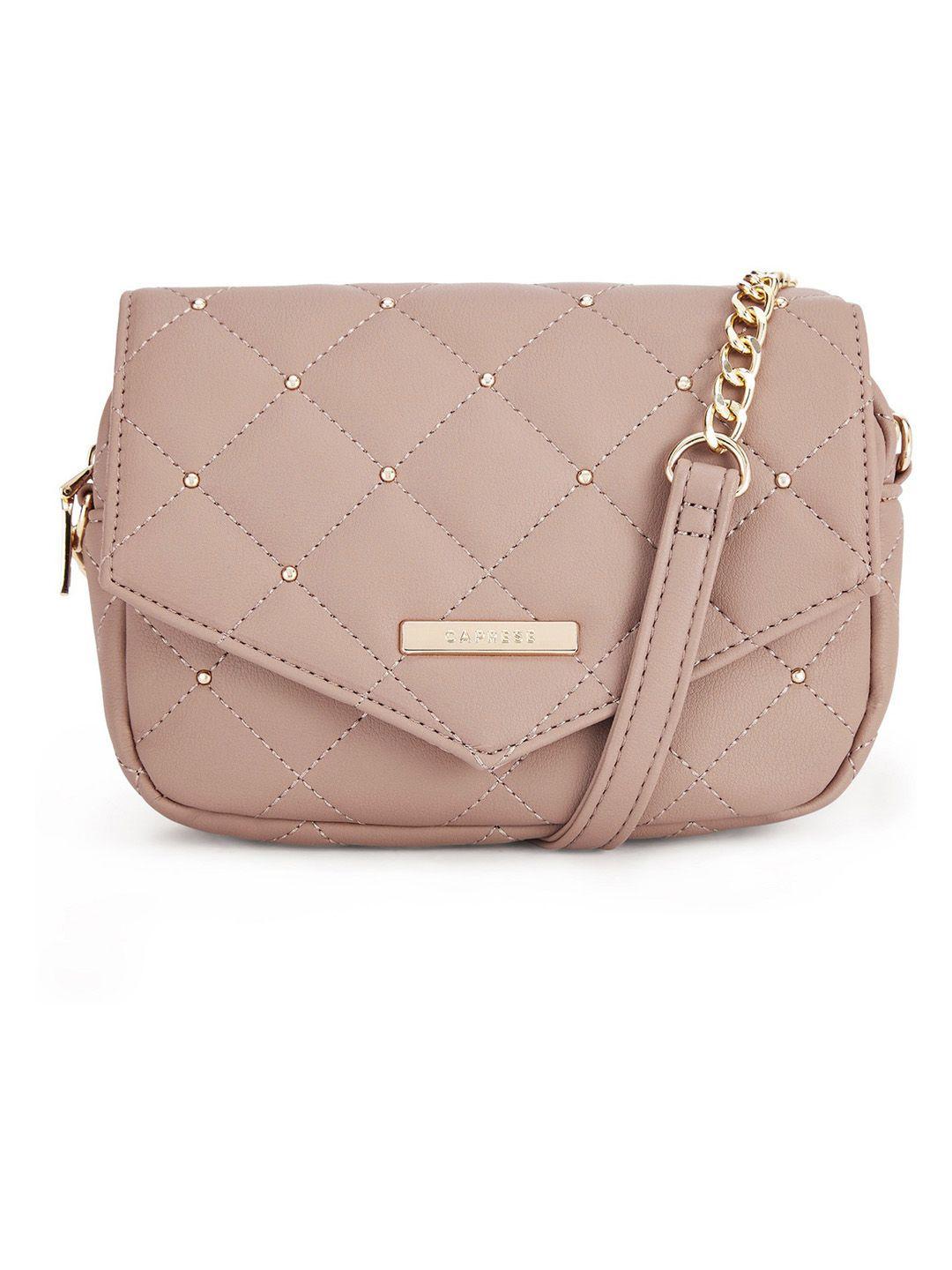 caprese peach-coloured quilted sling bag with non-detachable sling strap