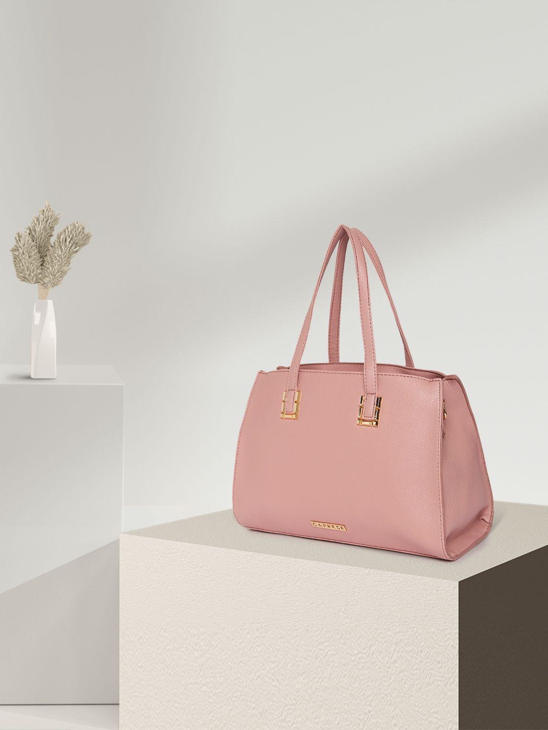 caprese peach-coloured solid thyma handheld bag