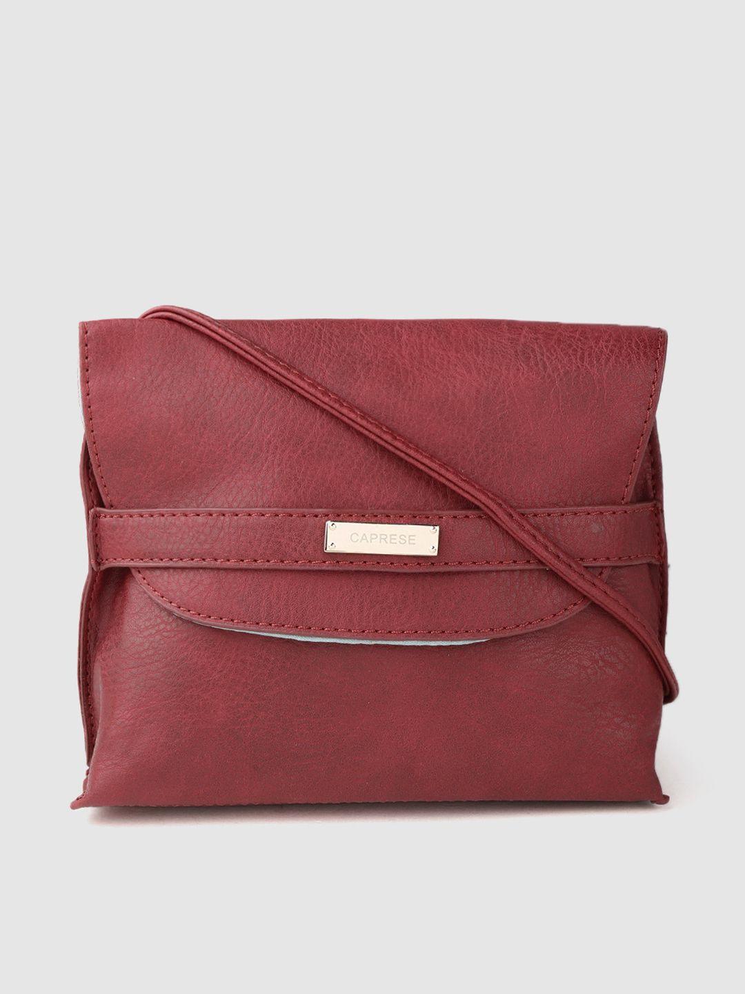 caprese red solid sling bag