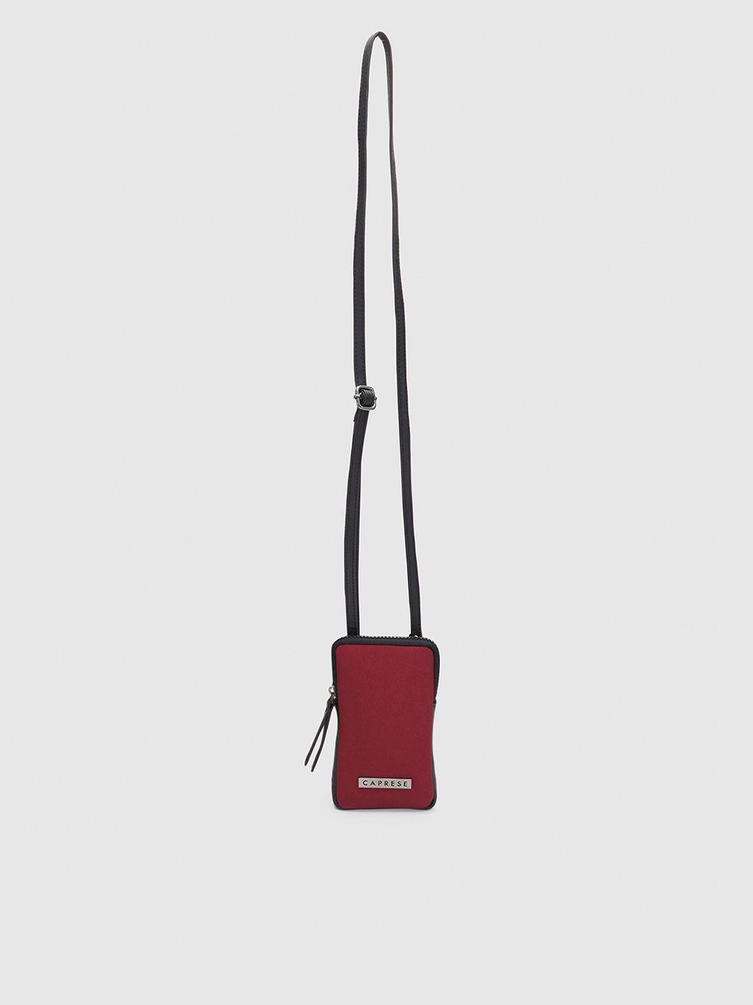 caprese textured structured leather sling bag