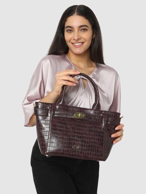 caprese treza brown faux leather solid handbag