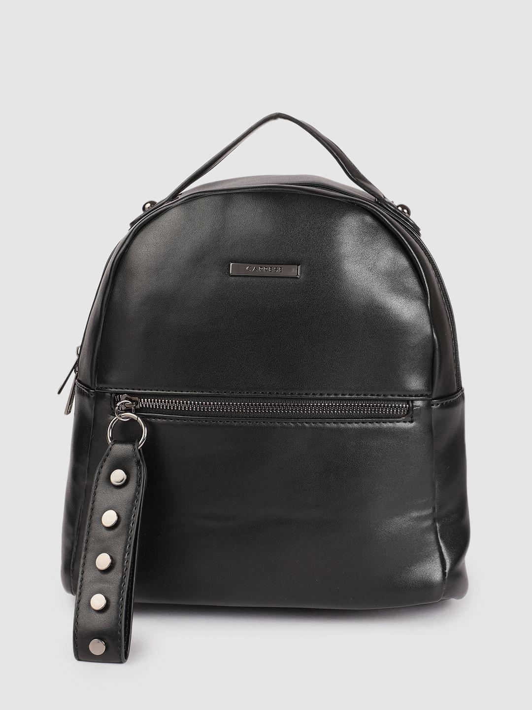 caprese women black solid rivets tasselled charlie backpack