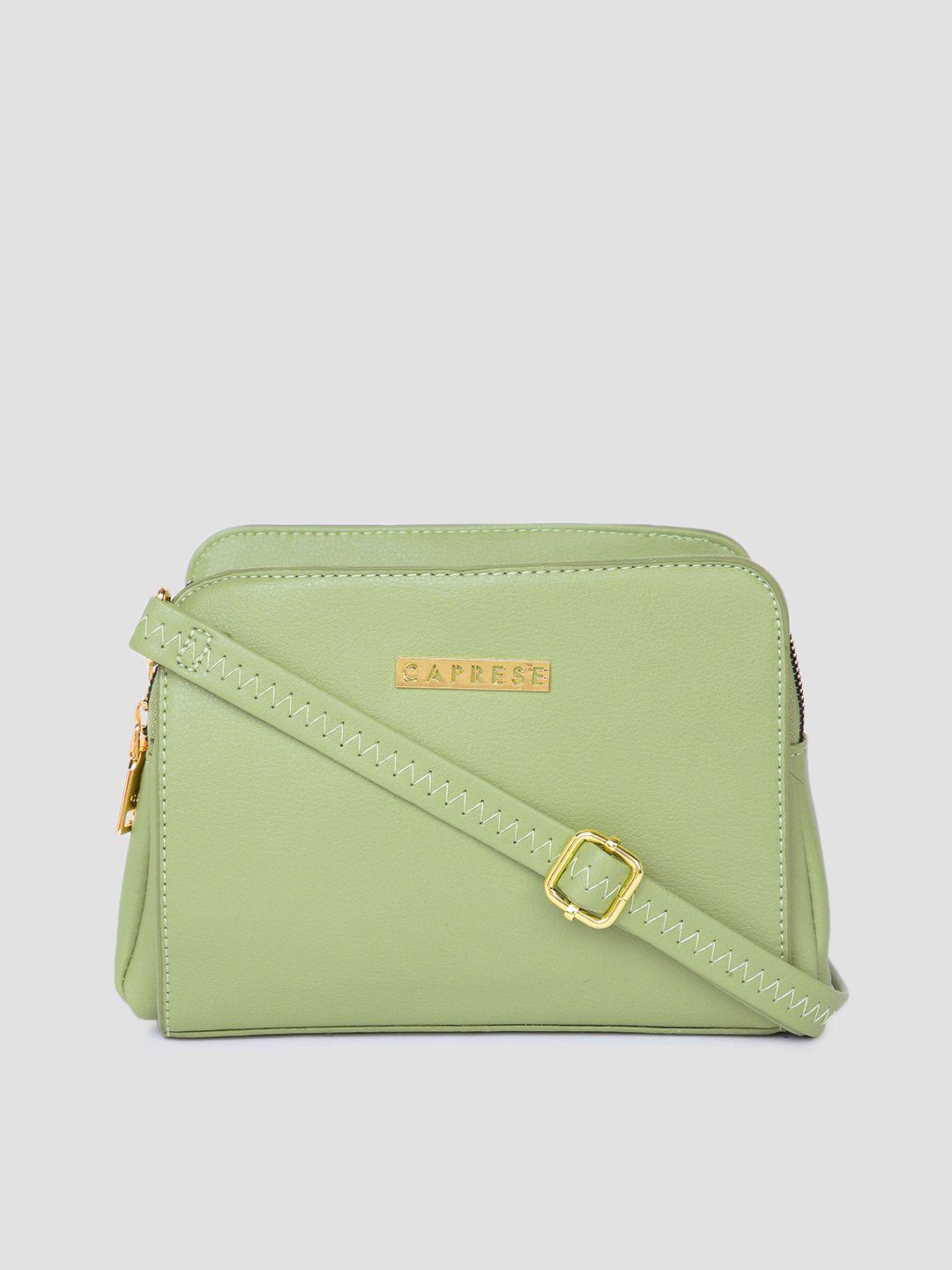 caprese women green solid leather sling bag