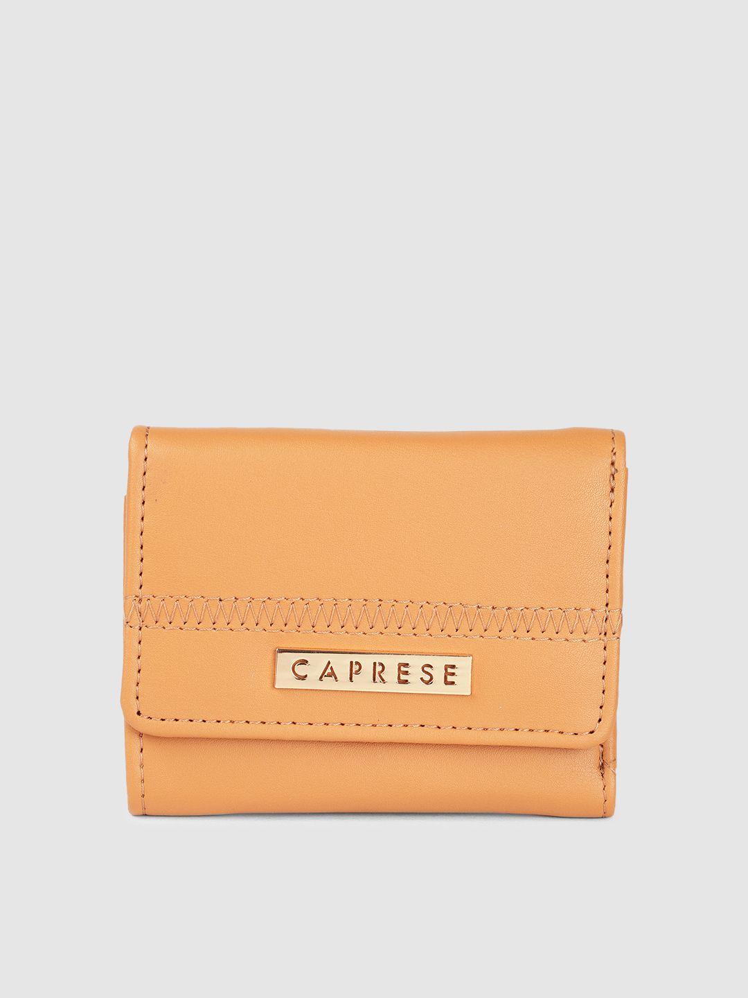 caprese women solid three fold wallet