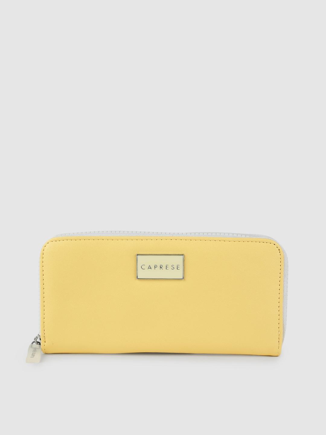 caprese women yellow & white solid leather zip around wallet
