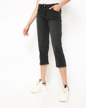 capri length skinny jeans with frayed hems