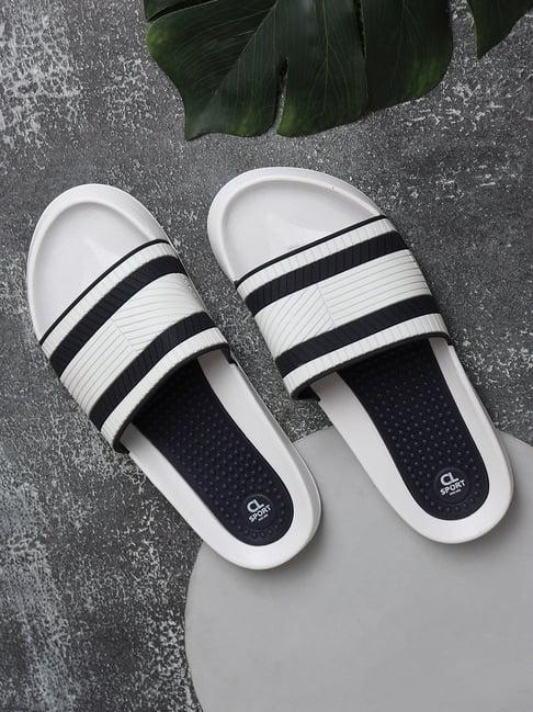 carlton london men's white slides