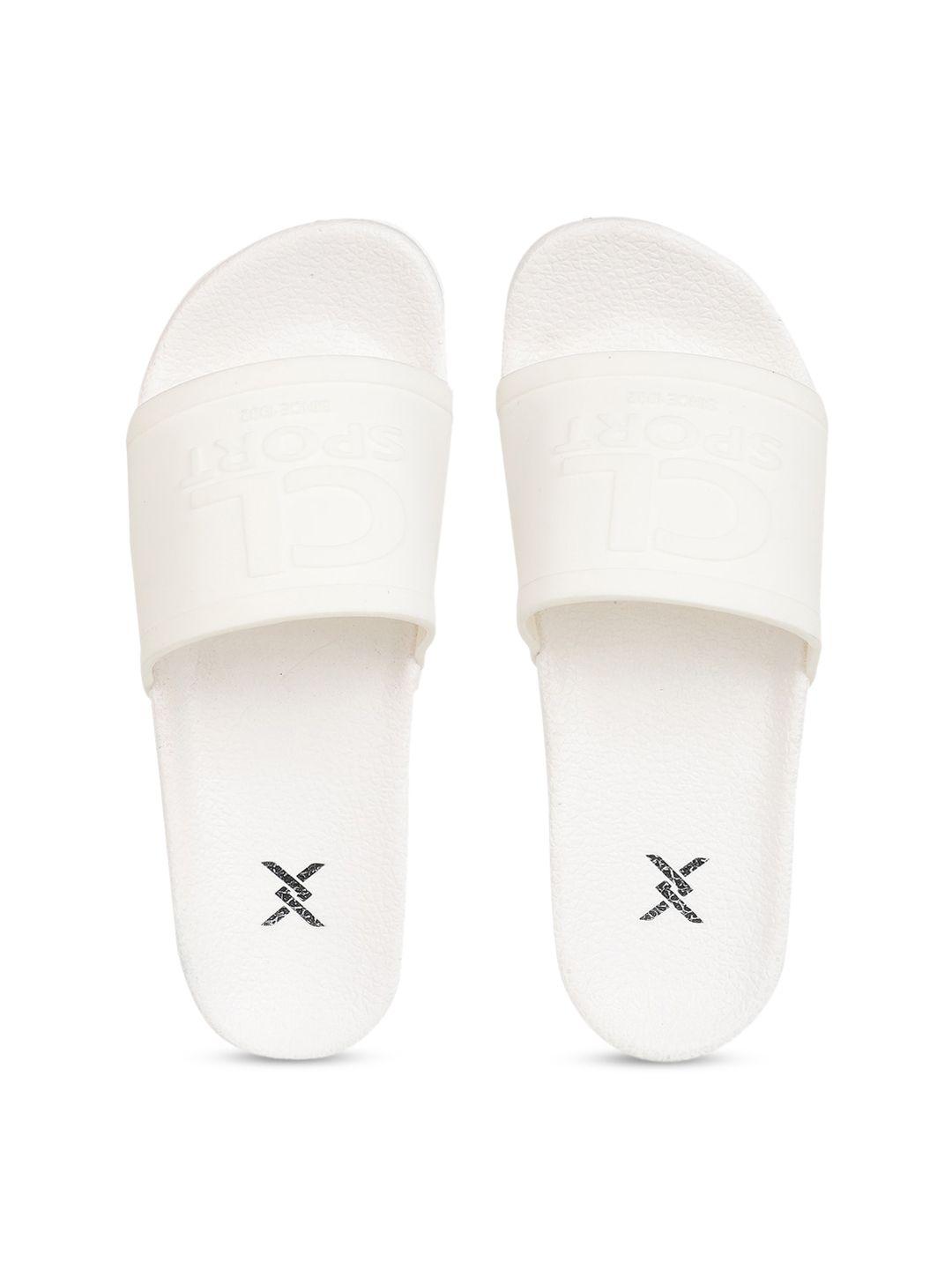 carlton london sports women white solid sliders