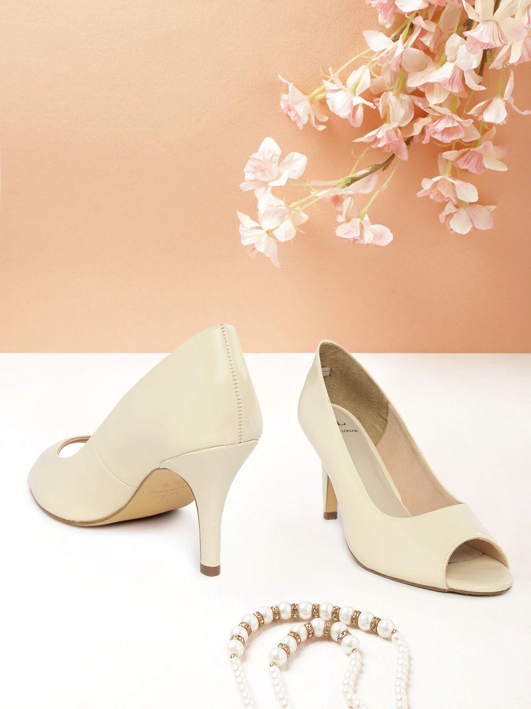 carlton london women cream-coloured solid heeled peep toes