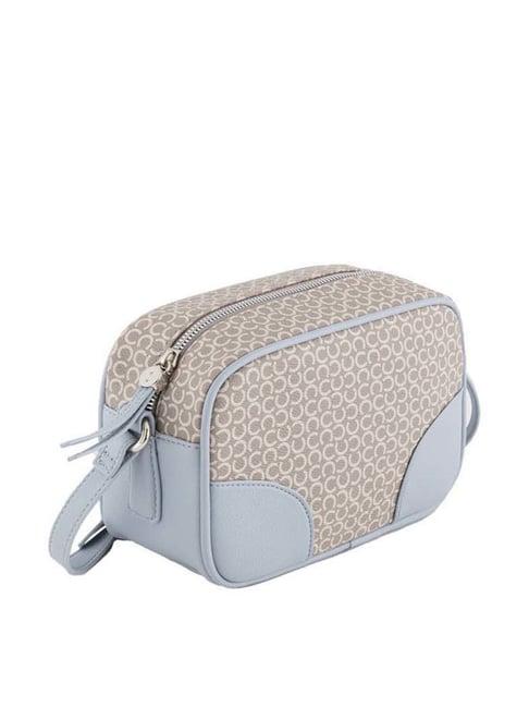 carpisa beige printed small sling handbag
