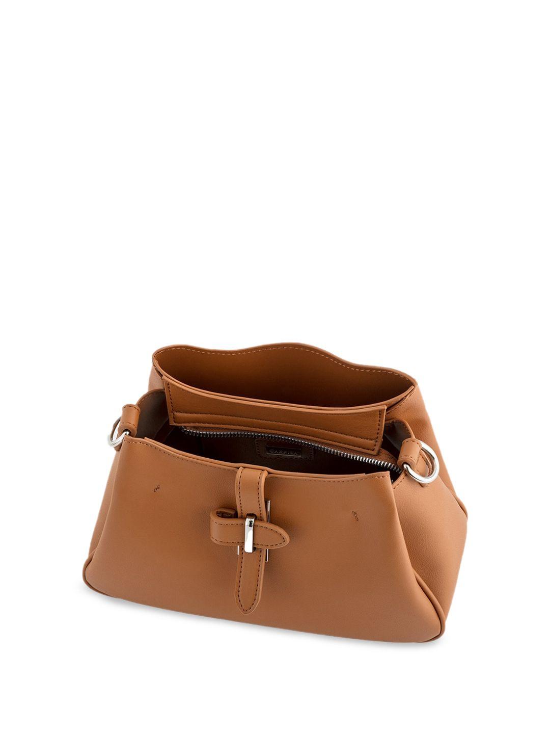 carpisa bucket sling bag