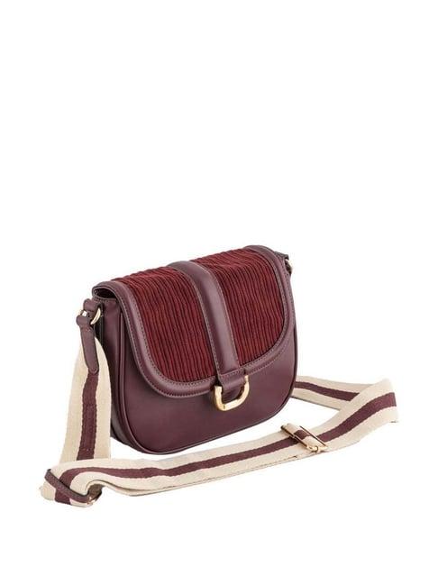 carpisa maroon textured small sling handbag