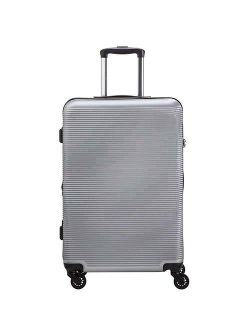 carpisa silver rigid space go medium checked luggage