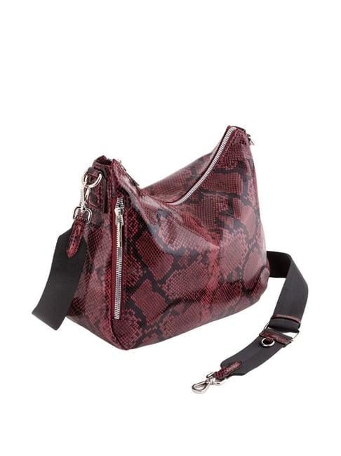 carpisa tamara plum faux leather textured sling handbag