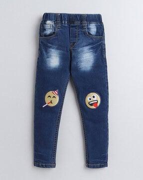 cartoon applique jeans with 5-pocket styling