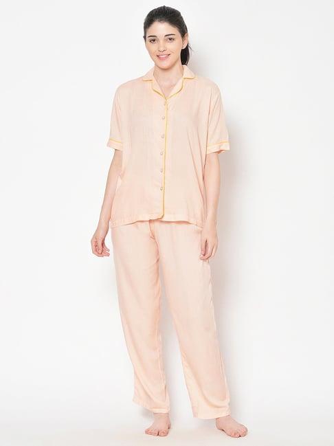 cation peach shirt with pyjamas