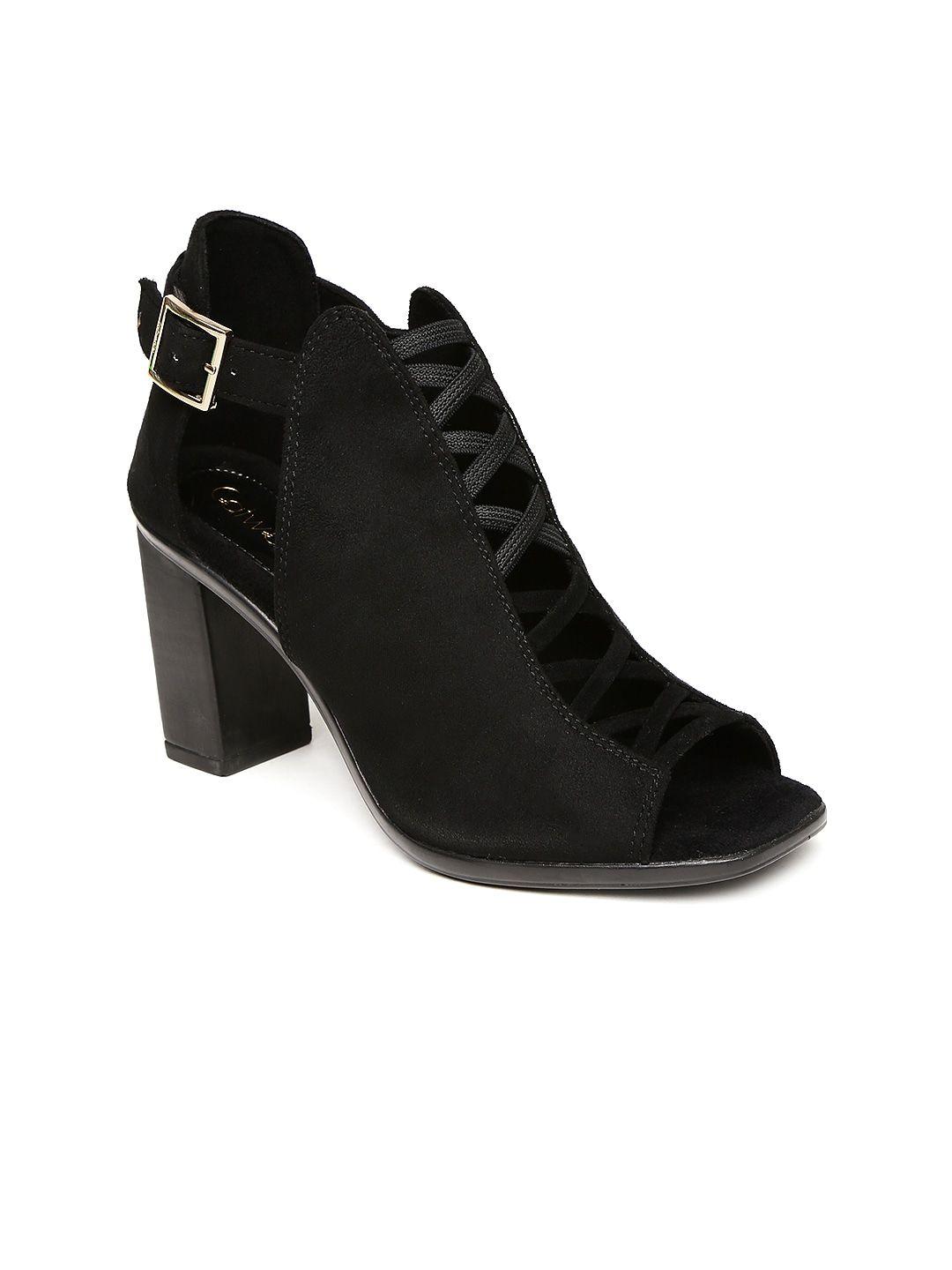 catwalk women black solid heeled boots