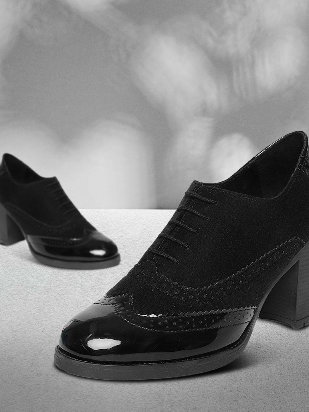 catwalk women black solid heeled boots
