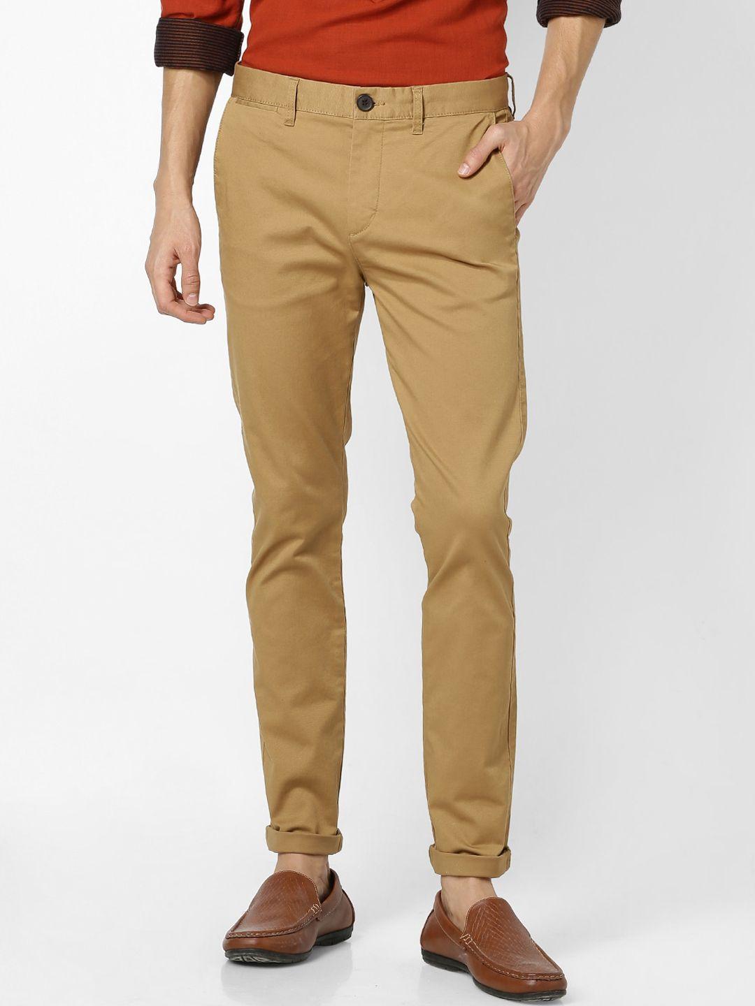 celio men camel brown skinny fit solid regular trousers