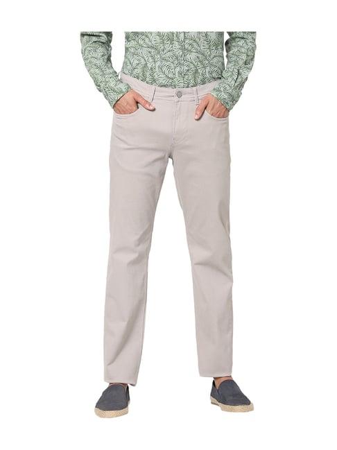 celio*beige solid slim fit trousers