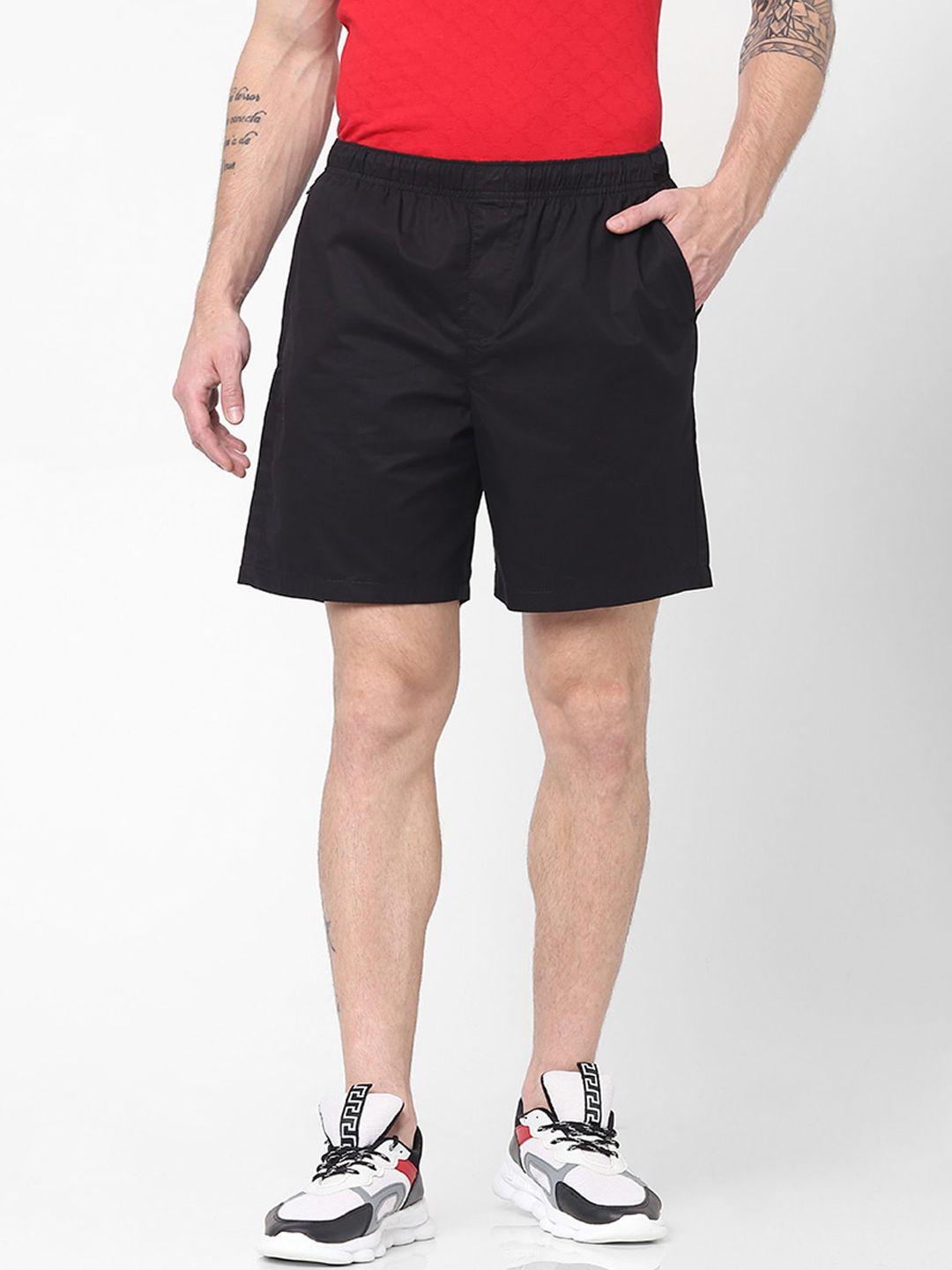 celio men black solid sports shorts