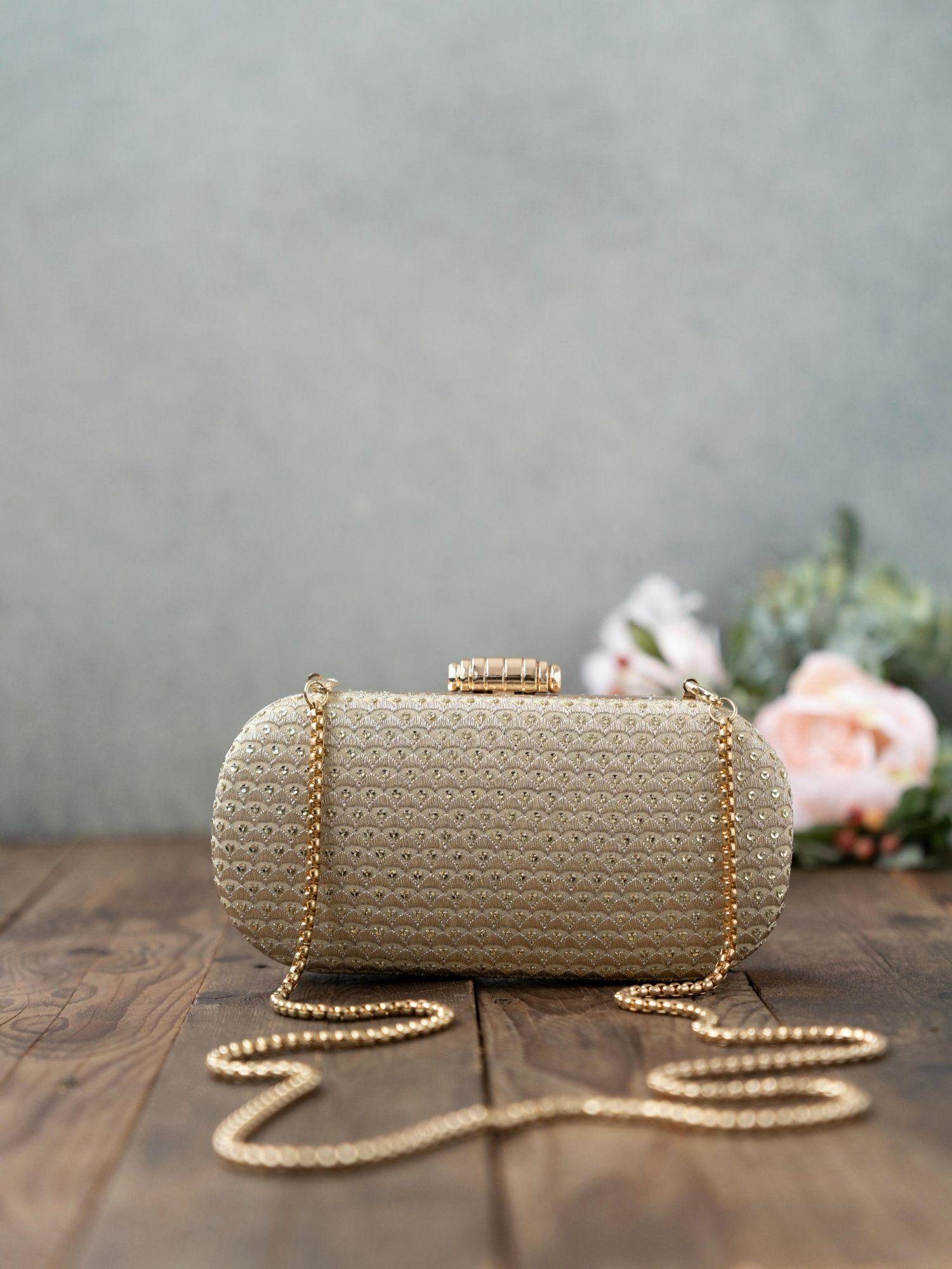 champagne light gold capsule clutch